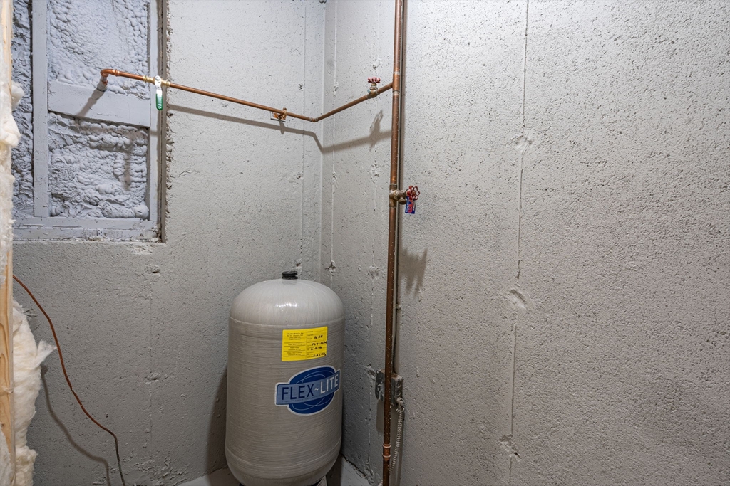 41 Casey Road Spencer, MA 01562 - Photo 29 of 39 a bathroom with a toilet and shower