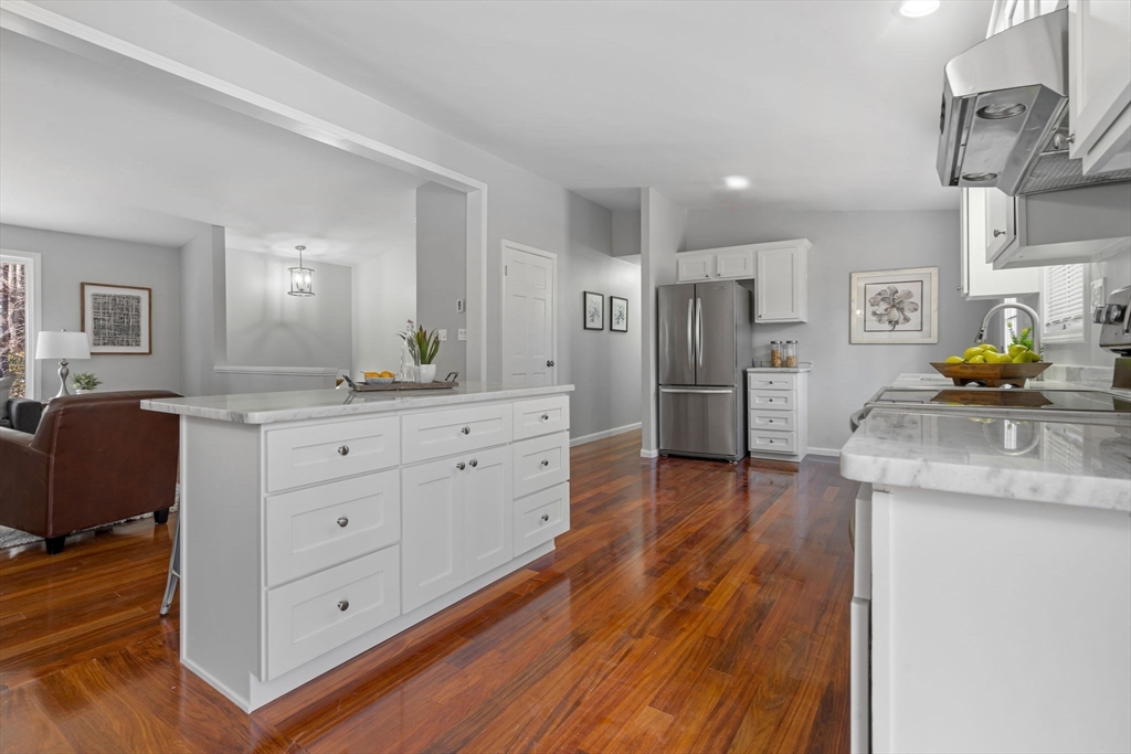 41 Casey Road Spencer, MA 01562 - Photo 10 of 39 a kitchen with stainless steel appliances kitchen island granite countertop a refrigerator and a sink