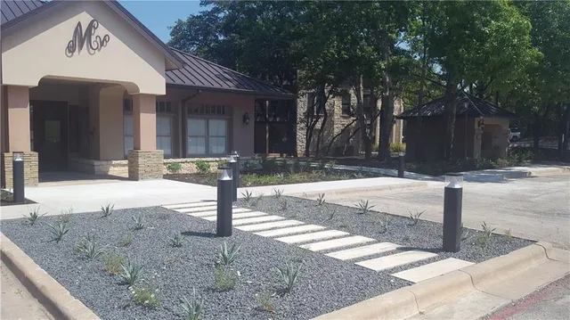 a front view of a house with street