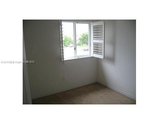 2314 Southeast 23rd Road, Unit 2314 Homestead, FL 33035 - Photo 12 of 13 a open space with a window