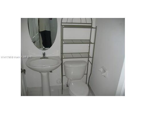 2314 Southeast 23rd Road, Unit 2314 Homestead, FL 33035 - Photo 3 of 13 a black and white photo of a room