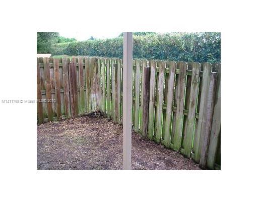 2314 Southeast 23rd Road, Unit 2314 Homestead, FL 33035 - Photo 7 of 13 a open view of a garden