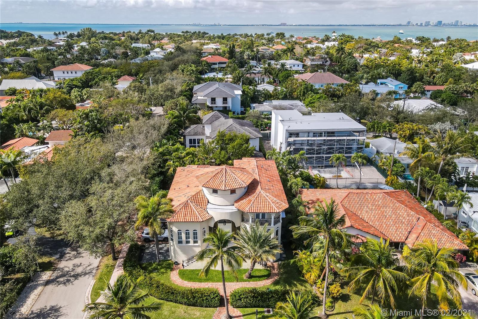 570 Hampton Lane Key Biscayne, FL 33149 - Photo 2 of 60 an aerial view of residential houses with outdoor space