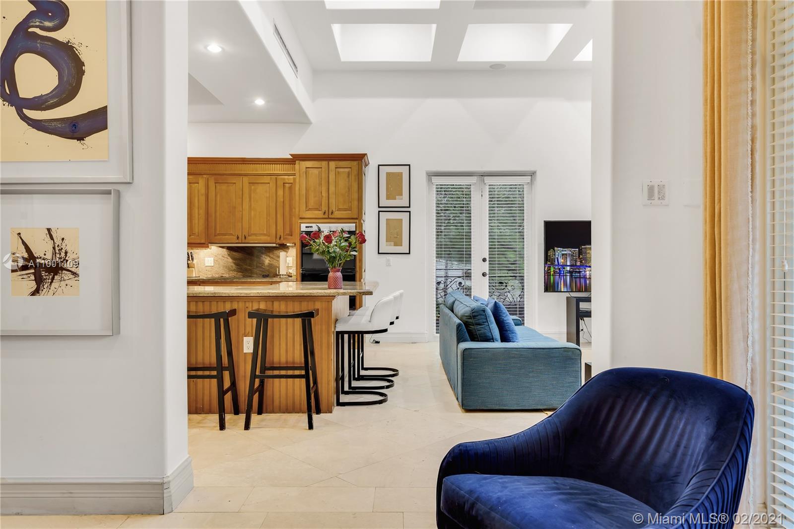 570 Hampton Lane Key Biscayne, FL 33149 - Photo 31 of 60 a living room with furniture and a window