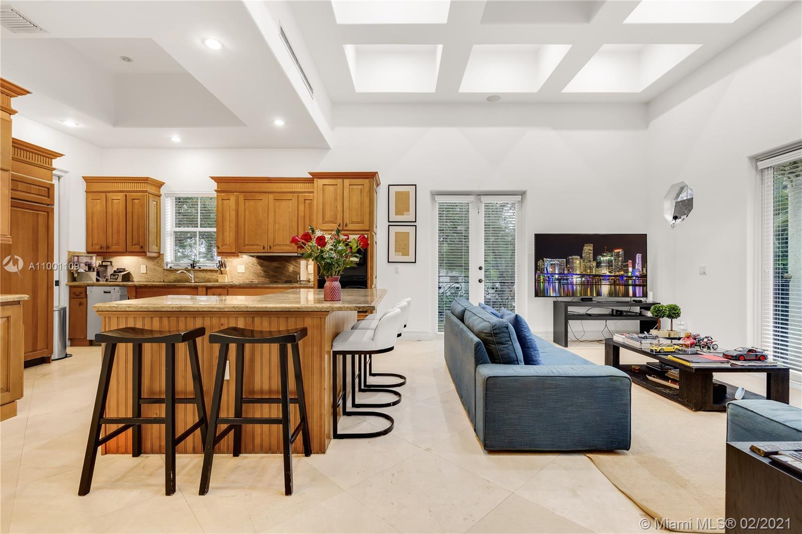 570 Hampton Lane Key Biscayne, FL 33149 - Photo 32 of 60 a living room with furniture and a flat screen tv