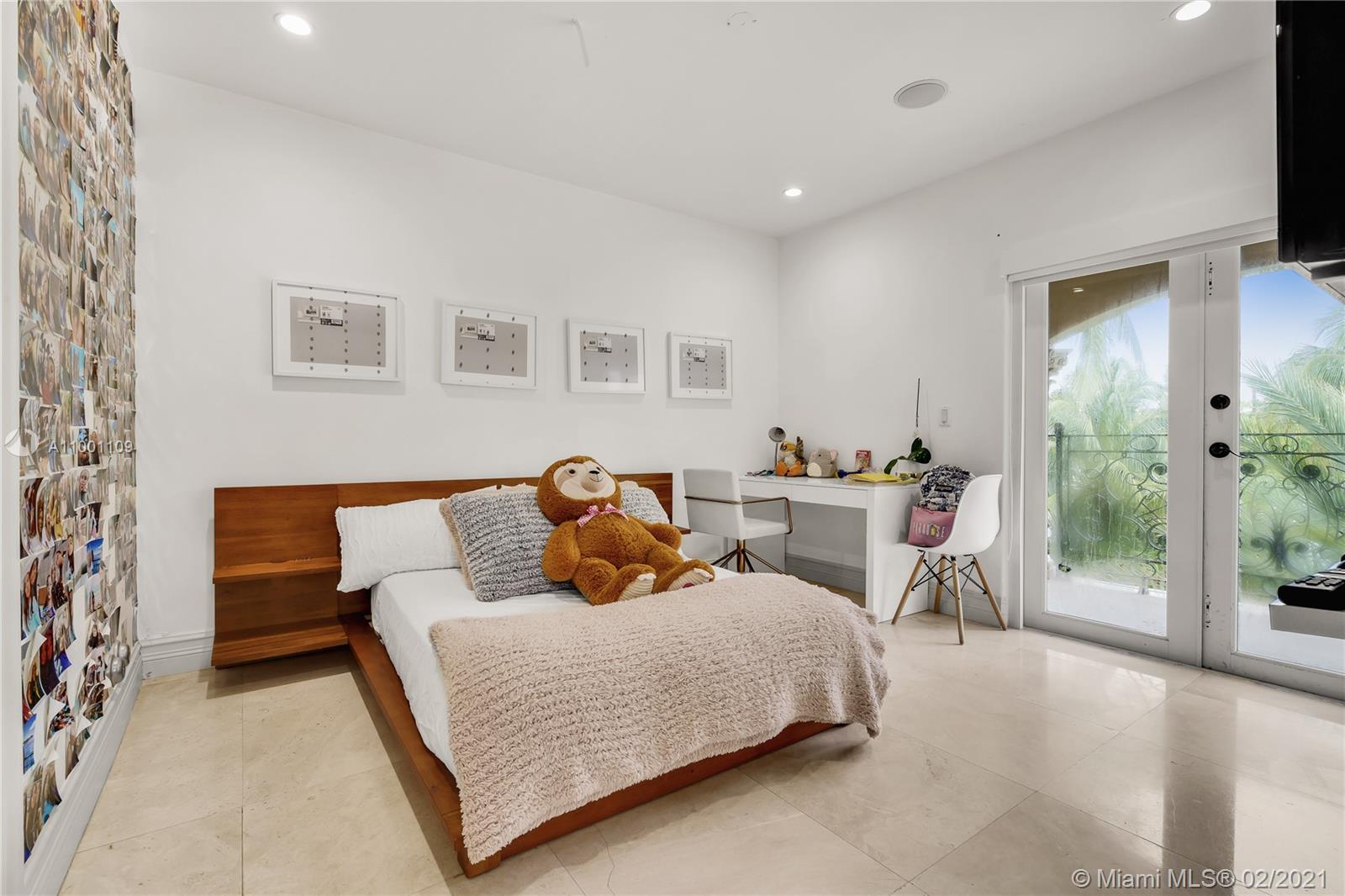 570 Hampton Lane Key Biscayne, FL 33149 - Photo 48 of 60 a living room with furniture and a table