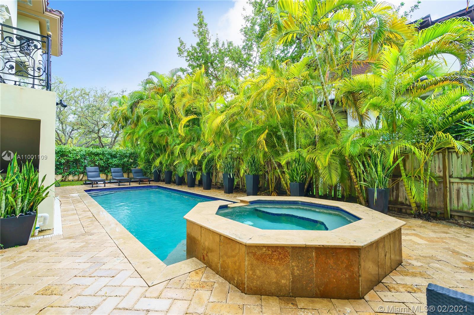 570 Hampton Lane Key Biscayne, FL 33149 - Photo 50 of 60 a view of swimming pool with garden