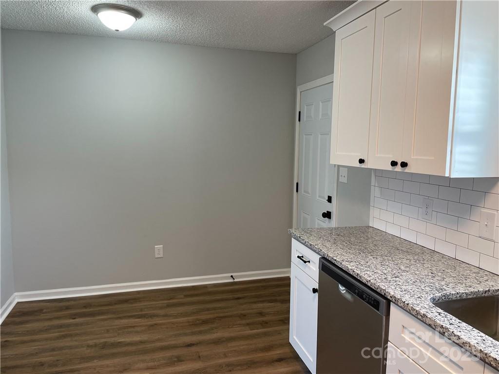 4581 County Home Road, Unit 2 Conover, NC 28613 - Photo 4 of 10 an empty room with wooden floor