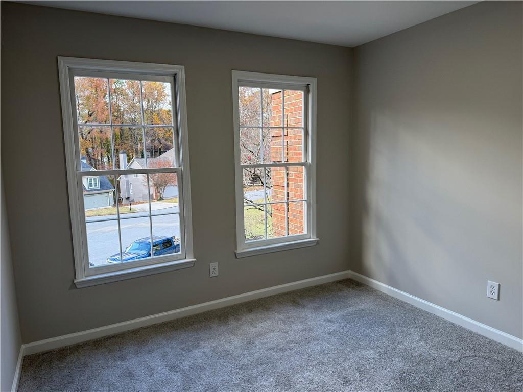5325 Hillgate Crossing Alpharetta, GA 30005 - Photo 24 of 35 an empty room with windows