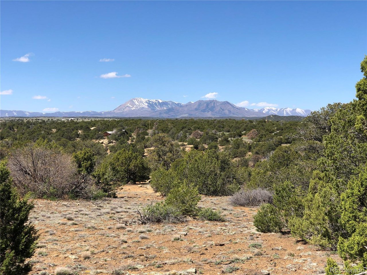 898 Rio Cucharas Phs 3 Walsenburg, CO 81089 - Photo 2 of 15 a view of lake with mountain