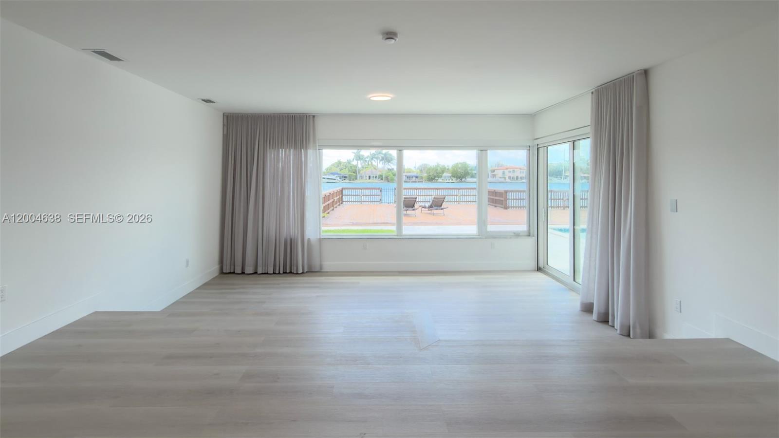 1690 Daytonia Road Miami Beach, FL 33141 - Photo 31 of 88 a view of an empty room with a window
