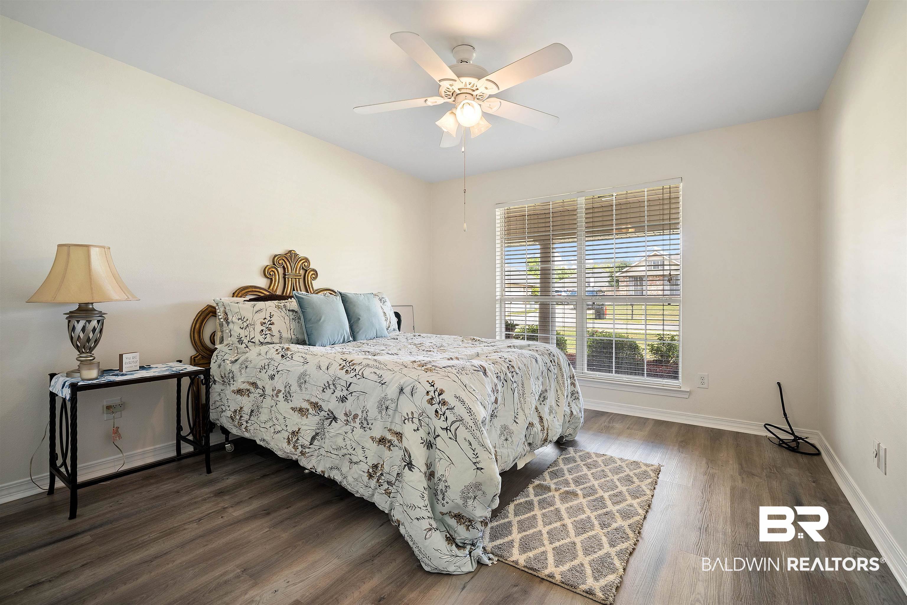 10713 Rigby Drive Mobile, AL 36695 - Photo 19 of 35 Bedroom featuring dark wood-style floors and a ceiling fan