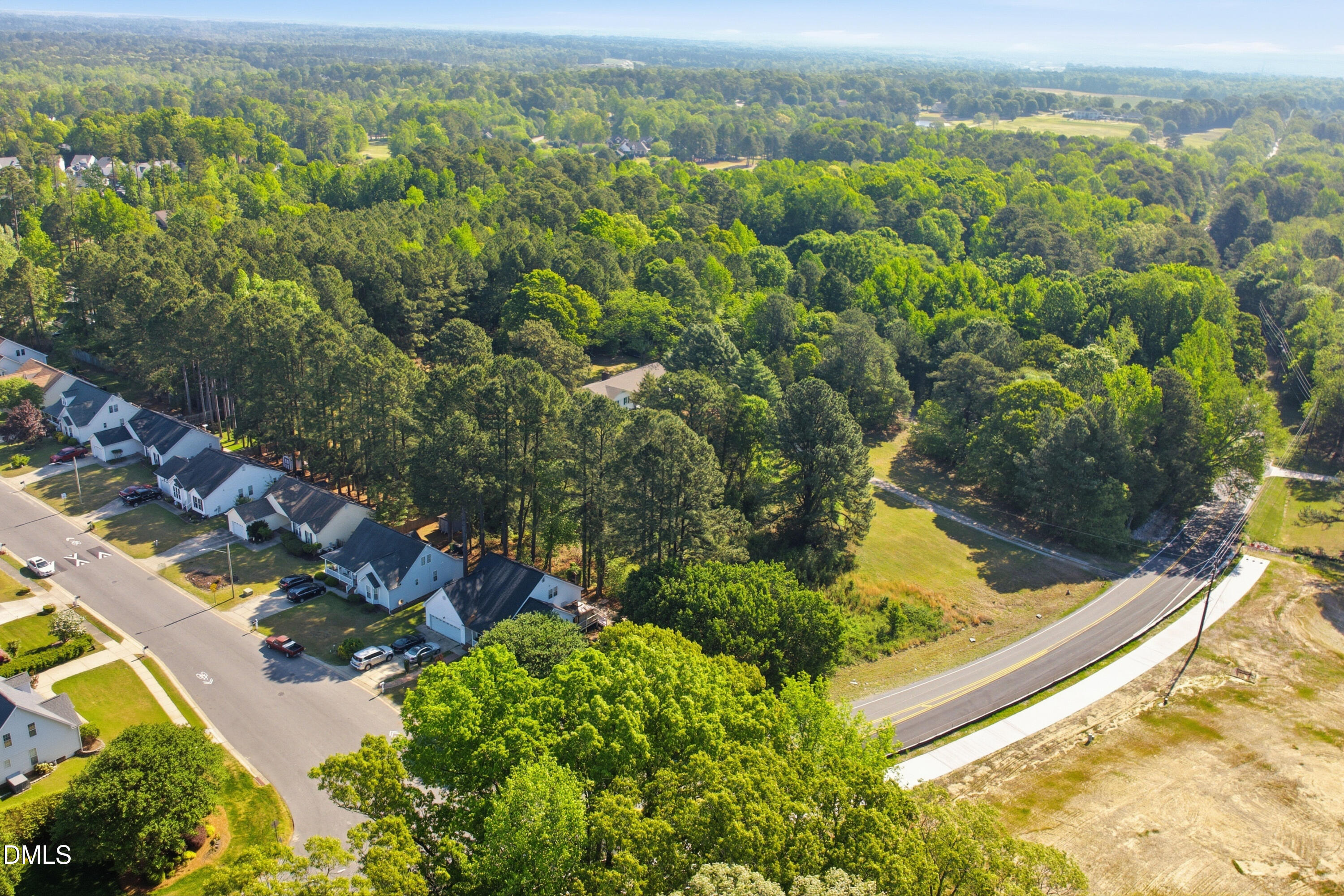 7101 Battle Bridge Road Raleigh, NC 27610 - Photo 13 of 13 an aerial view of residential houses with outdoor space
