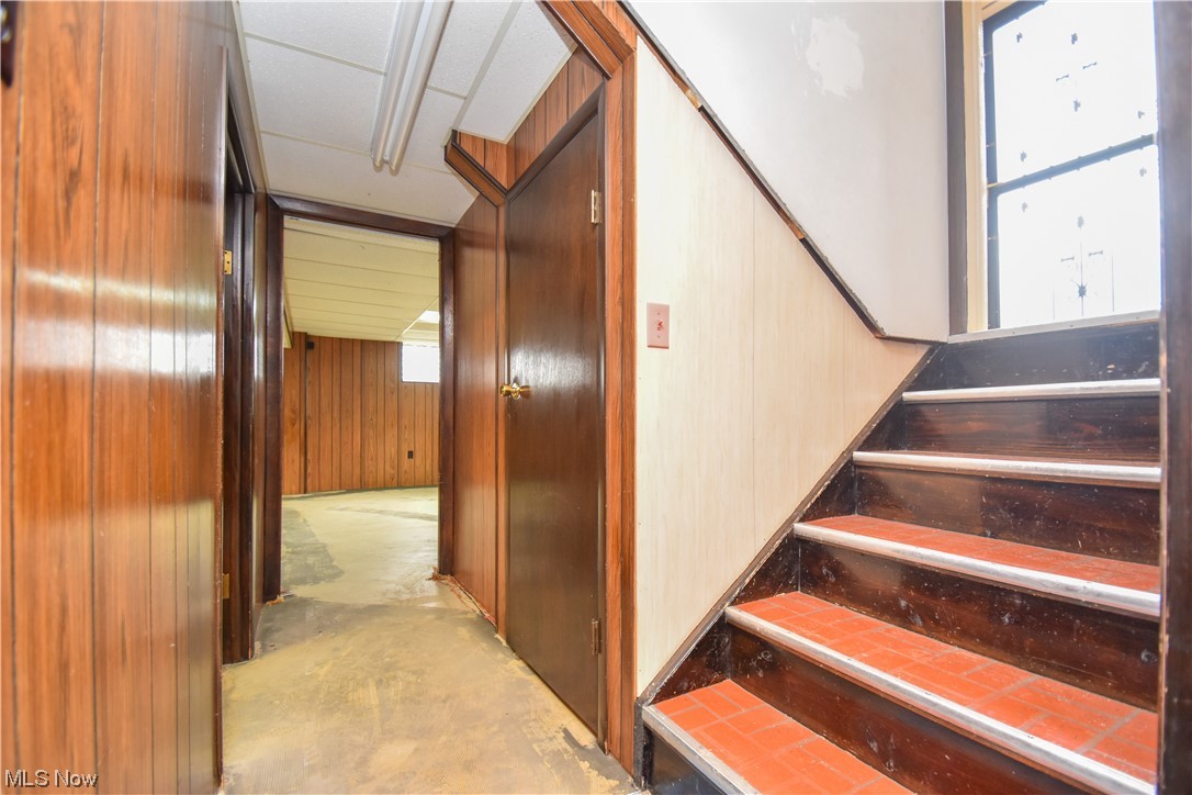 47700 Summerset Road East Liverpool, OH 43920 - Photo 23 of 35 Stairway featuring wood walls