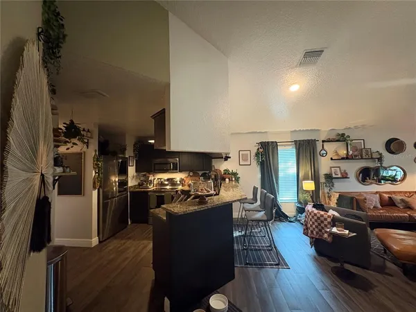 a view of a dining room with furniture