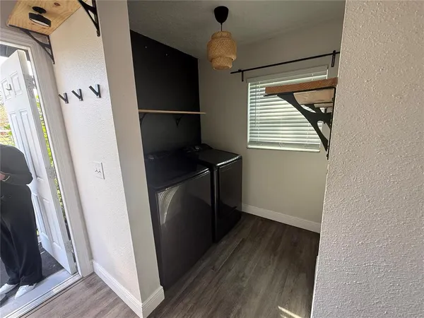 a view of a hallway with stairs