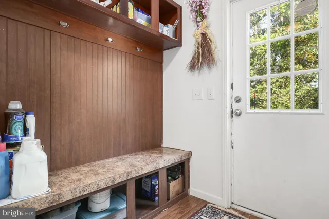 a room with a table and chairs