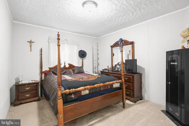 a bedroom with a bed and a closet