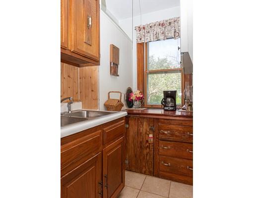 94 King Philip Road Worcester, MA 01606 - Photo 8 of 17 a kitchen with a sink and cabinets