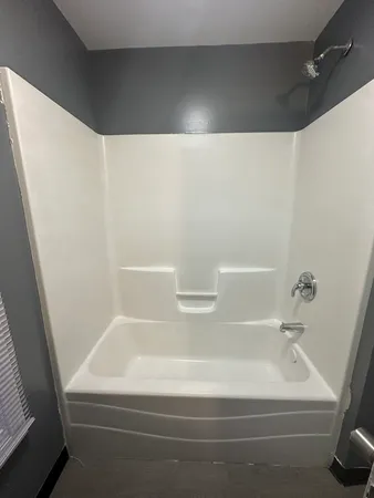 a bathroom with a bathtub