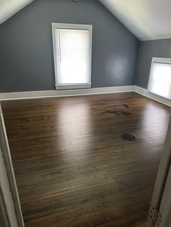 a view of an empty room and window