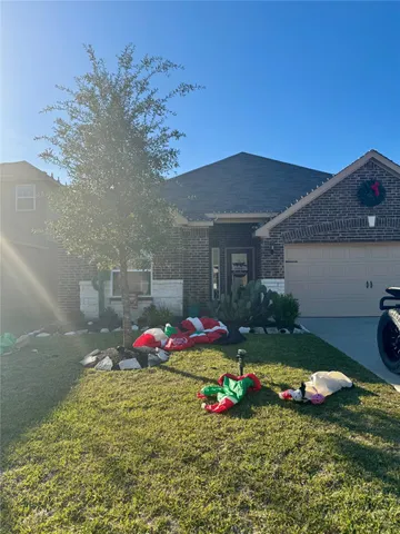 a front view of house with yard