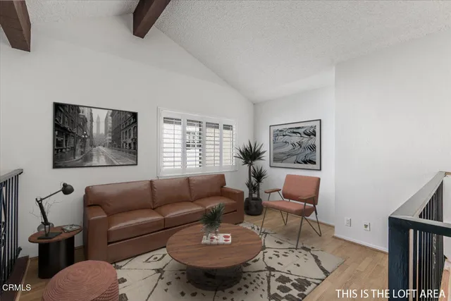 a bathroom with 2 sink and a mirror