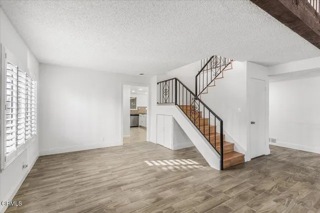 a view of kitchen with wooden floor