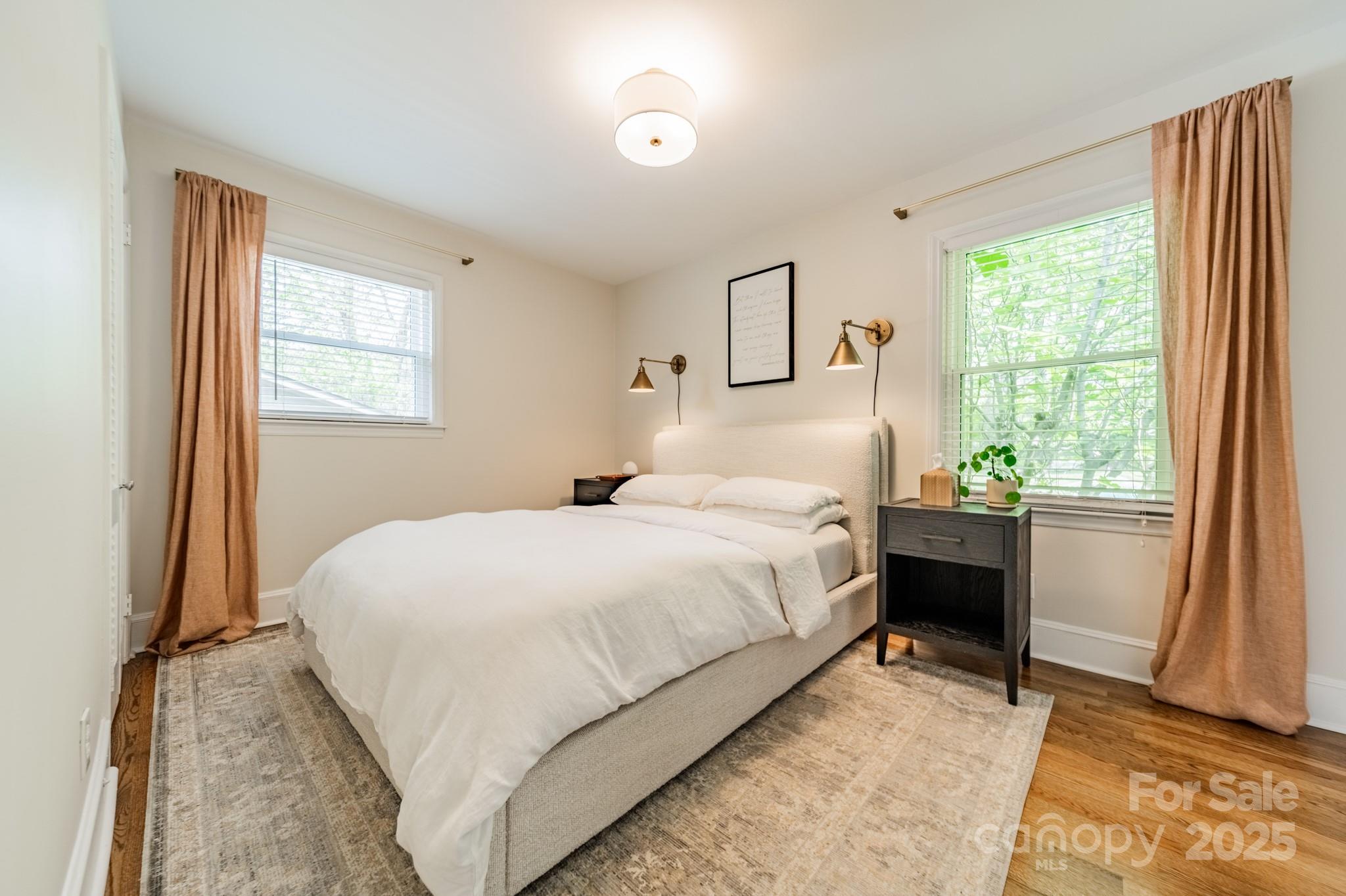 6339 Montpelier Road Charlotte, NC 28210 - Photo 21 of 35 a bedroom with a bed and a window