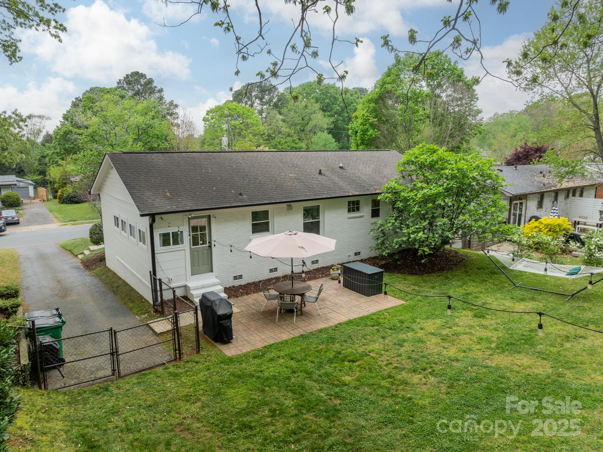 6339 Montpelier Road Charlotte, NC 28210 - Photo 30 of 35 an aerial view of a house having patio with a garden