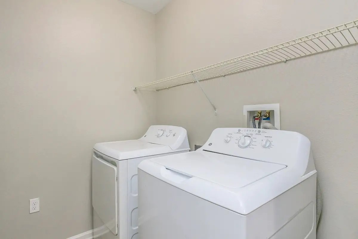 6454 Airline Highway Baton Rouge, LA 70805 - Photo 13 of 16 a utility room with dryer and washer
