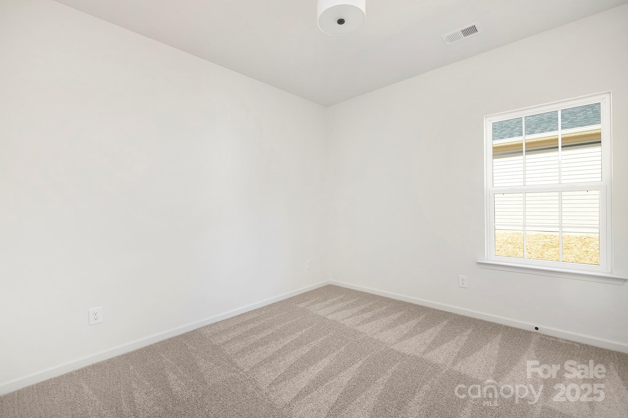 159 Dry Dock Loop Mooresville, NC 28117 - Photo 11 of 18 an empty room with a window