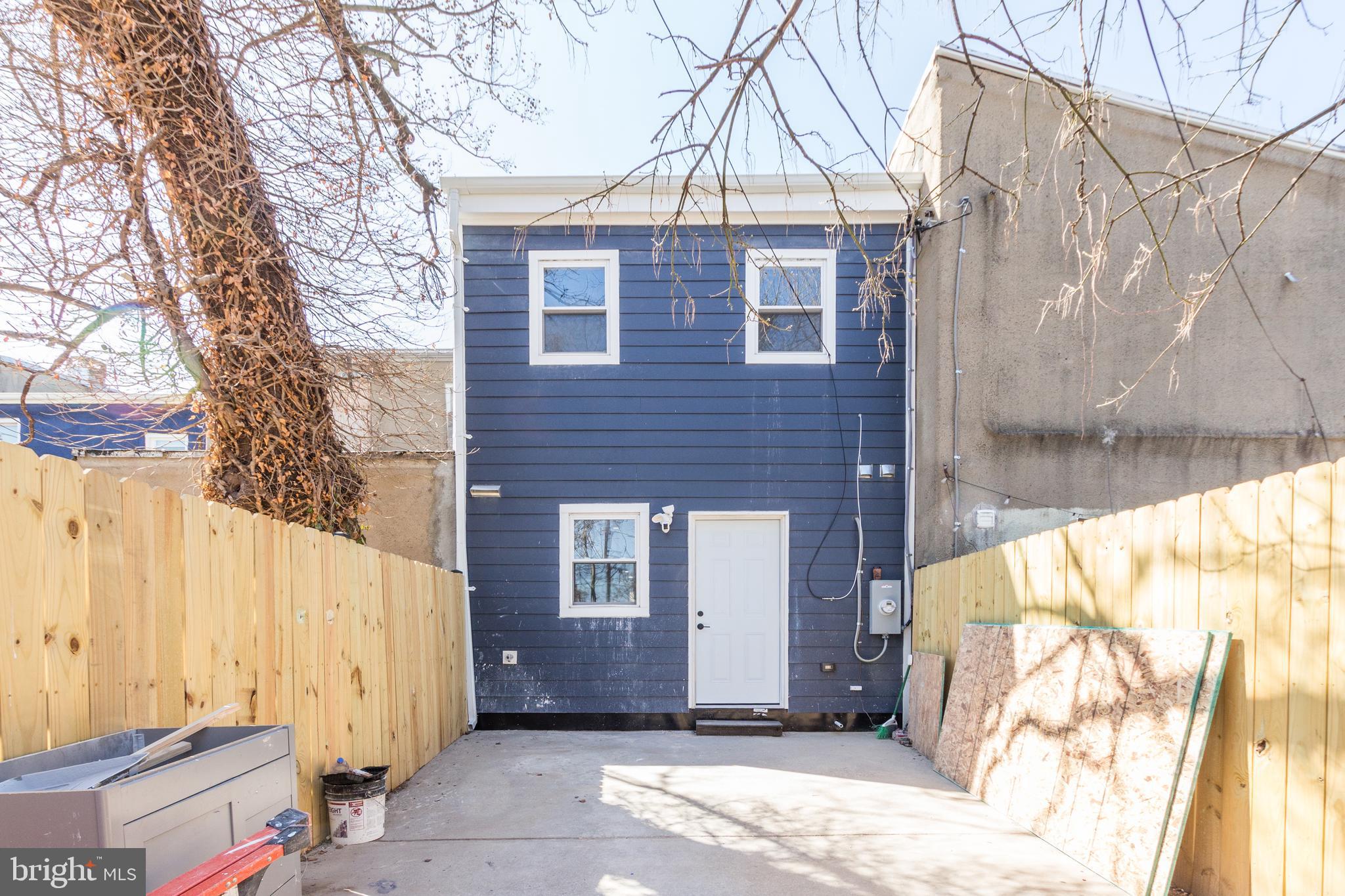 1613 Aisquith Street Baltimore, MD 21202 - Photo 42 of 46 a view of a house with a yard