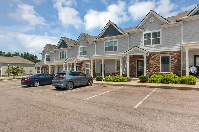 a car parked in front of a house