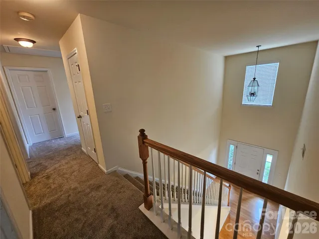 a view of a hallway with entryway