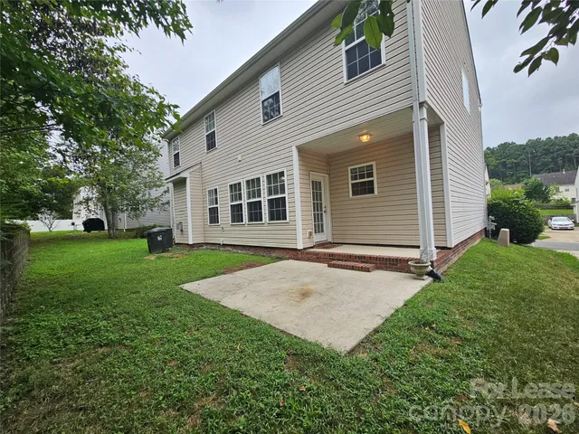 a view of a backyard with a garden