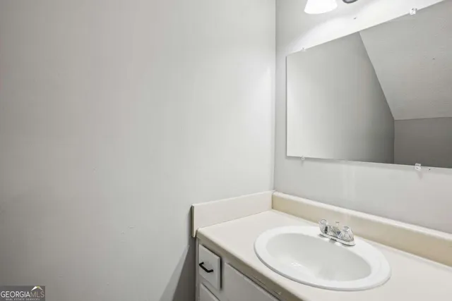 a balcony with wooden floor and fence