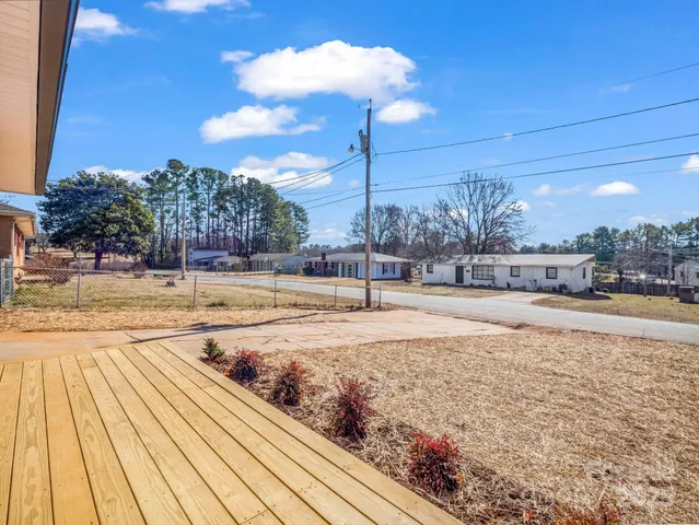 a view of a swimming pool with an outdoor seating