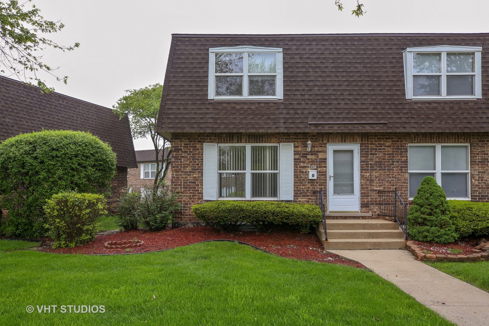 2250 Heather Road Homewood, IL 60430 - Photo 1 of 10 a front view of a house with garden