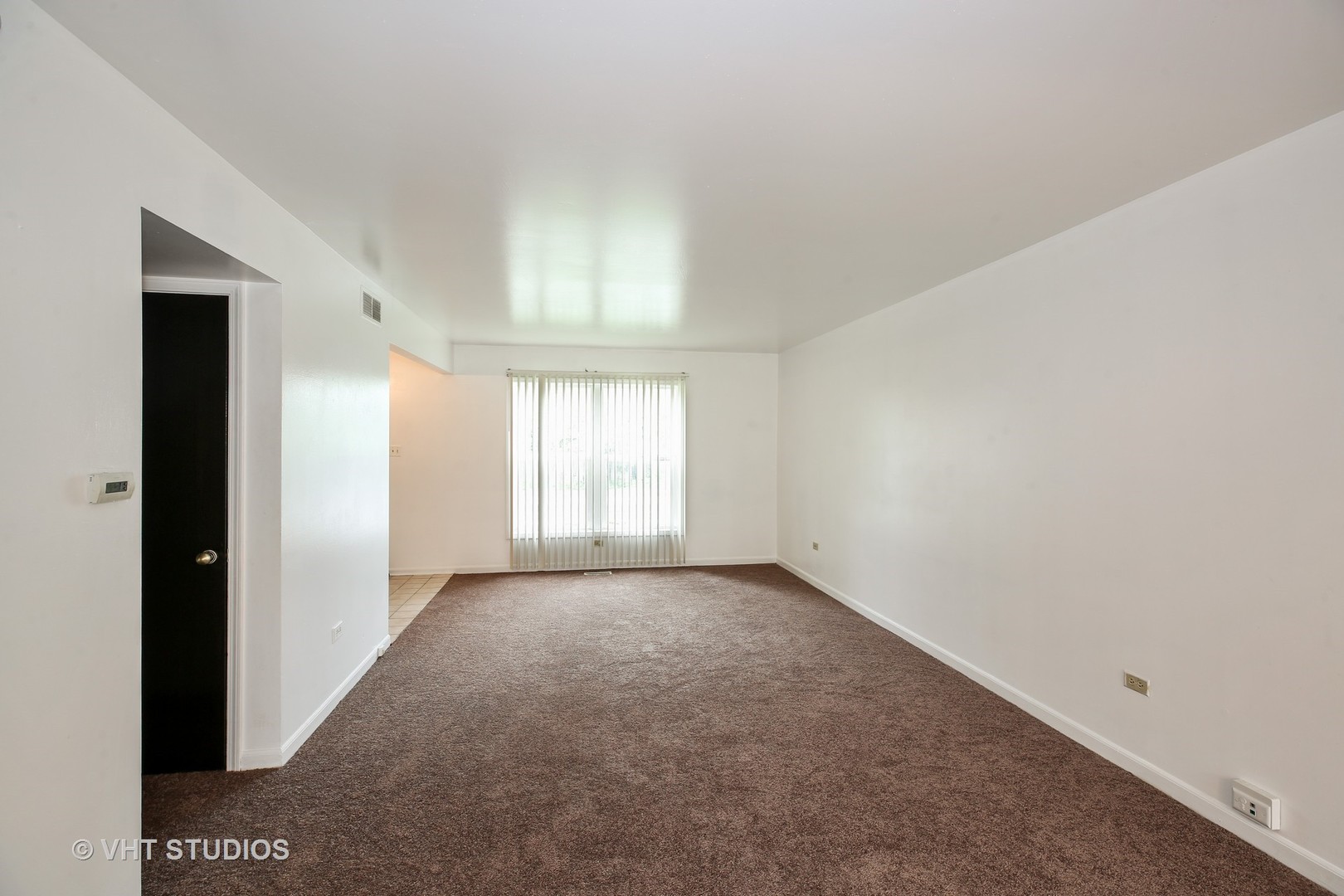 2250 Heather Road Homewood, IL 60430 - Photo 2 of 10 a view of an empty room with a window