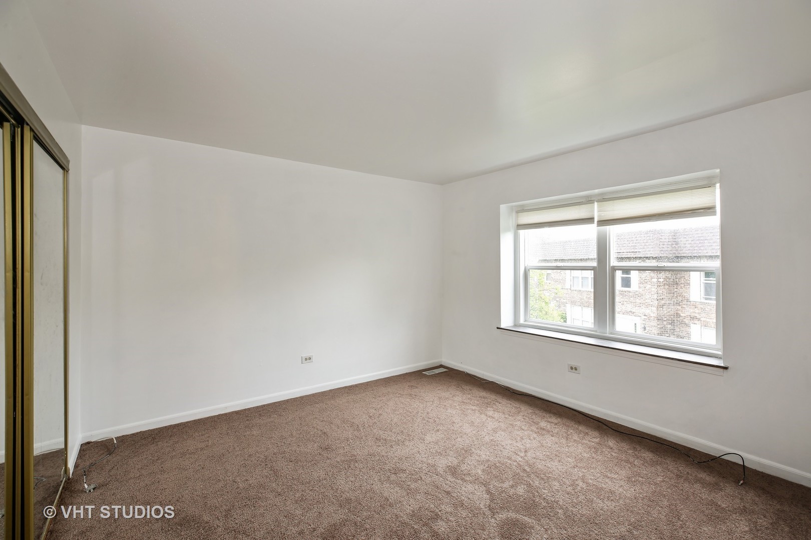 2250 Heather Road Homewood, IL 60430 - Photo 6 of 10 an empty room with a window