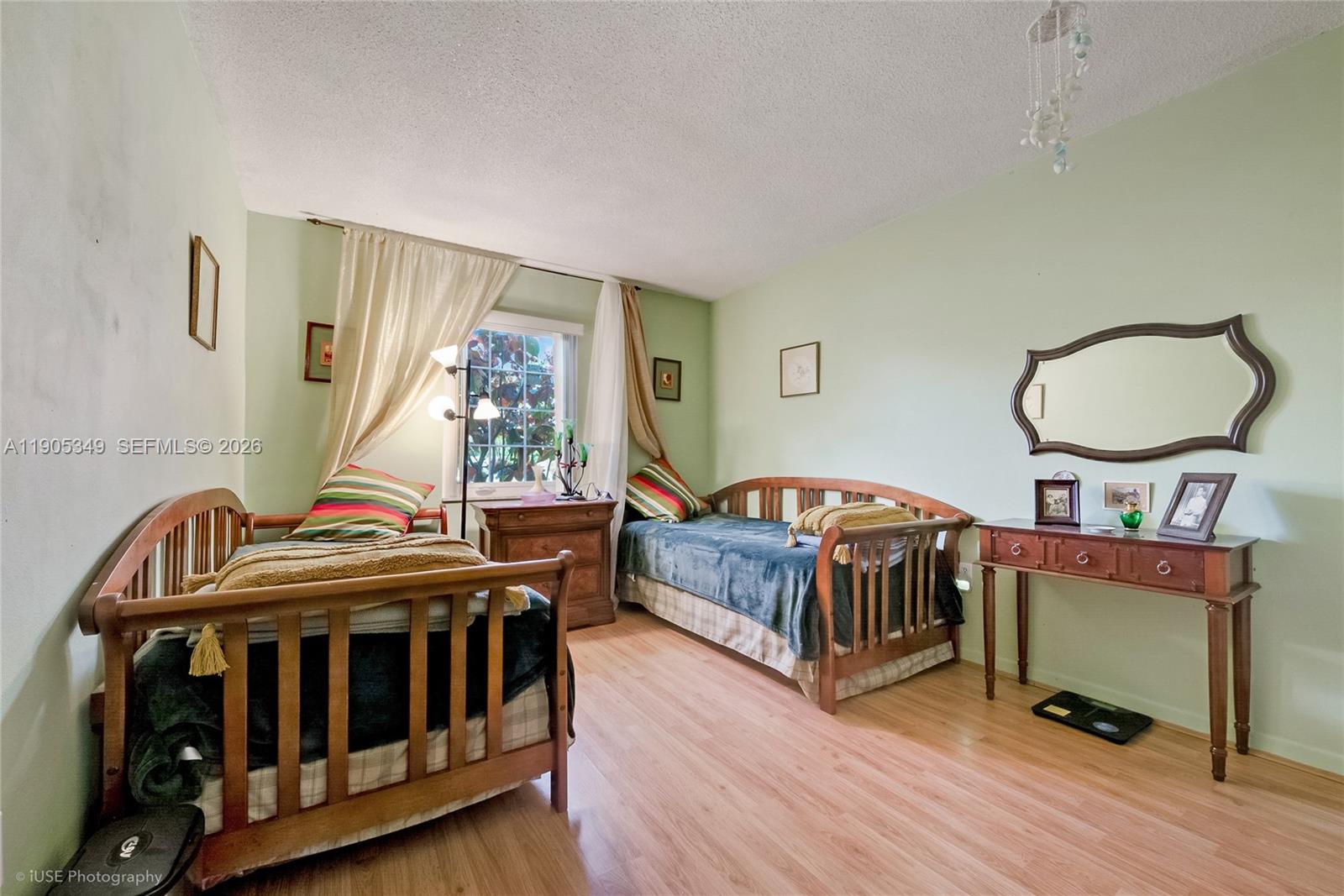 9500 Southwest 79th Street Miami, FL 33173 - Photo 14 of 19 a bedroom with two beds and a window