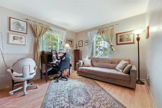 a living room with furniture and a window
