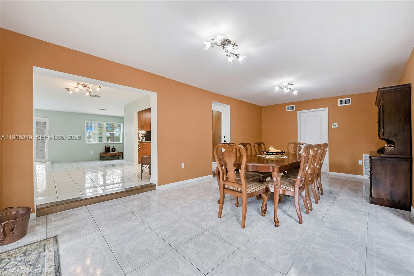 9500 Southwest 79th Street Miami, FL 33173 - Photo 5 of 19 a view of a dining room with furniture