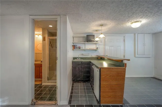 $350,000 | 6509 Northwest Twin Oaks Drive, Kansas City, MO 64151