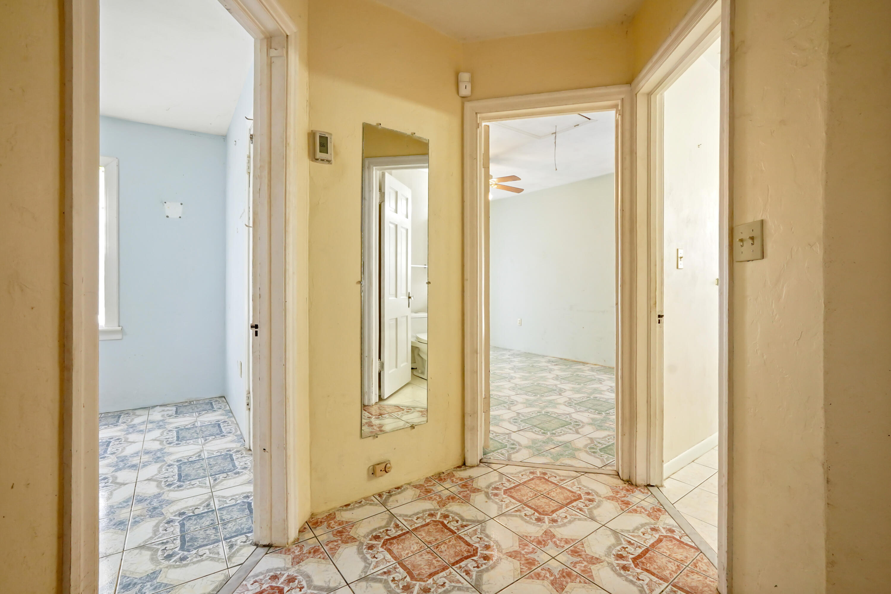3858 Lakewood Road Palm Springs, FL 33461 - Photo 11 of 40 a view of a bathroom with a shower and a sink