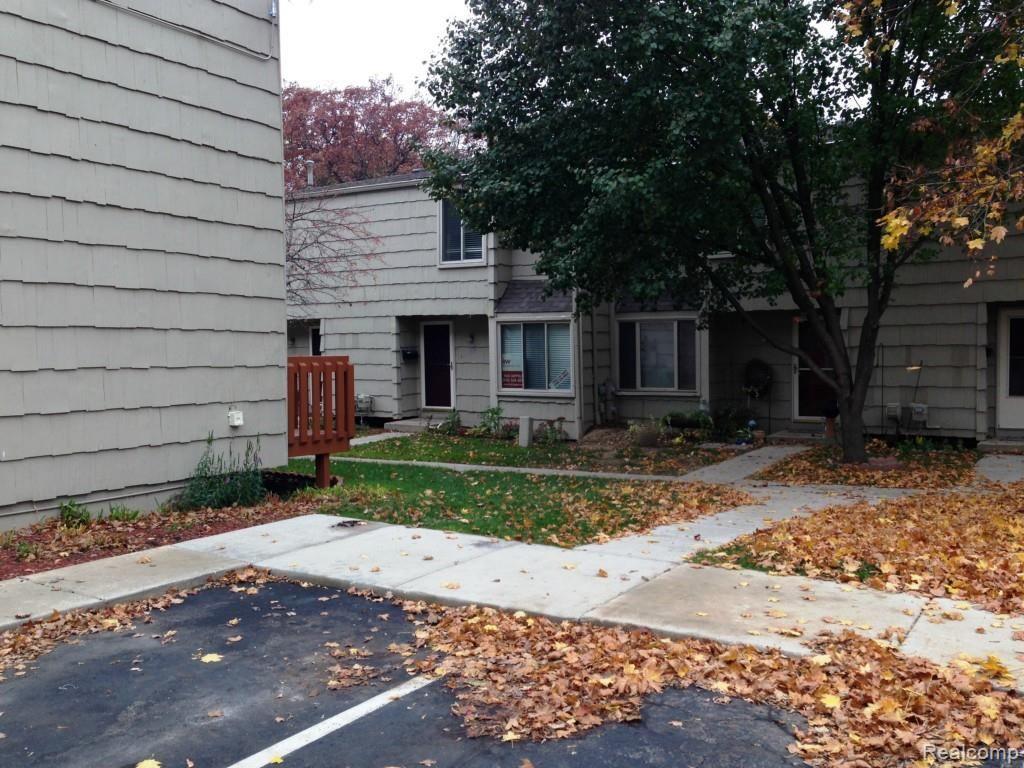616 Rickett Road, Unit 109 Brighton, MI 48116 - Photo 3 of 38 Front View from Parking Space.jpg