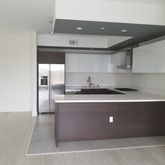a kitchen with stainless steel appliances a sink stove and refrigerator
