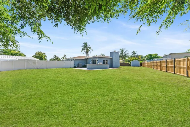 a house view with a garden space