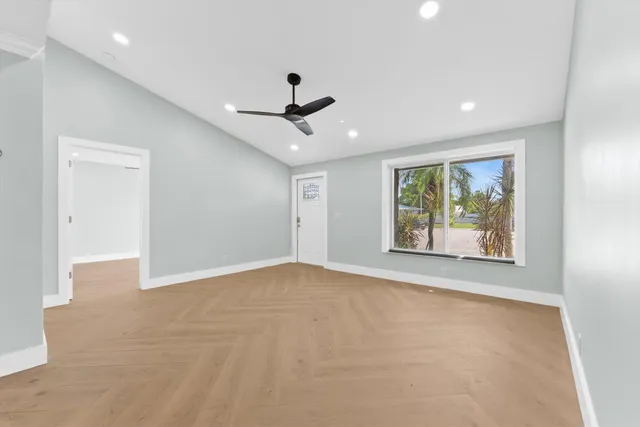 a view of an empty room with a window